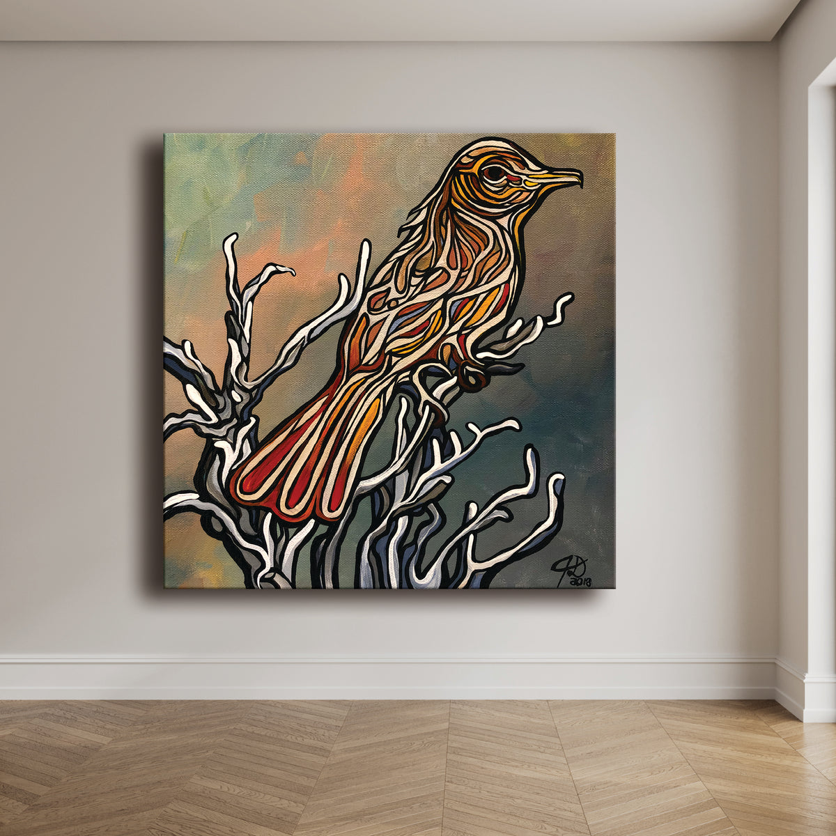 A square canvas painting by Jeff Dillon Fine Art  of a stylized bird perched on bare branches, displayed on a light beige wall above a wood herringbone floor. The painting features a warm orange and red bird with black outlines against a textured background of green, orange, and dark gray.