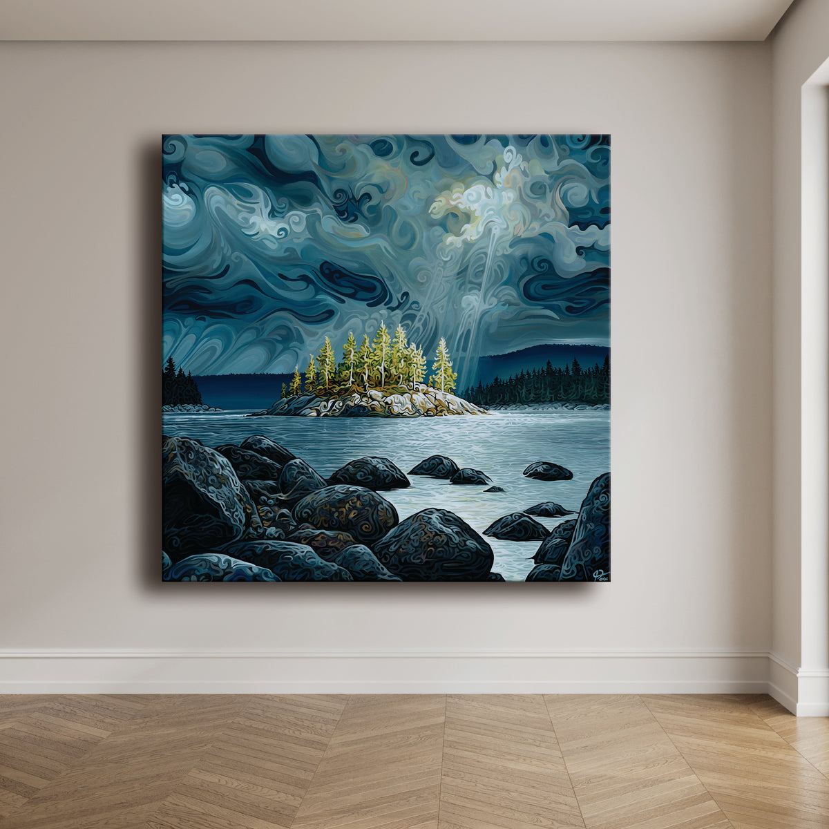 A square canvas painting by Jeff Dillon depicting a dramatic, swirling blue and grey storm sky over a calm lake with a small pine-covered island, dark rocks in the foreground, and distant forested hills.